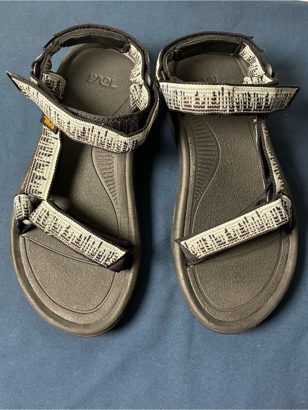 Teva women’s Black Sandals with White Patterned Straps